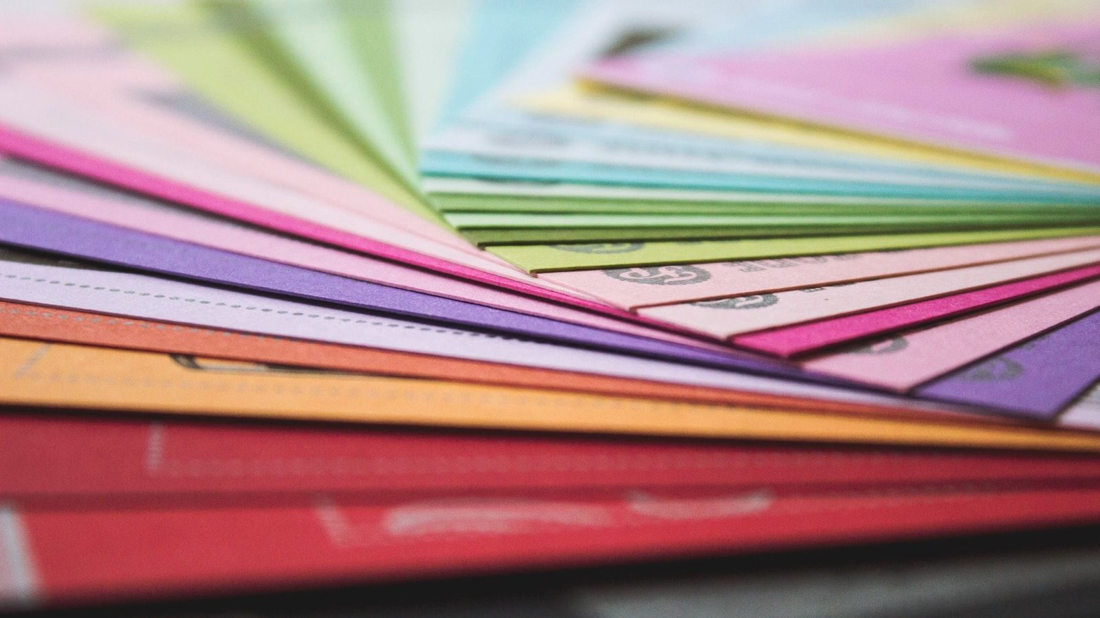 direction générale des services a close up of many different colored papers