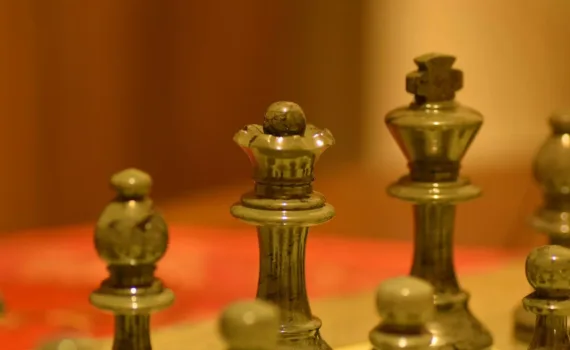 ludothèque stainless steel chess piece on white table