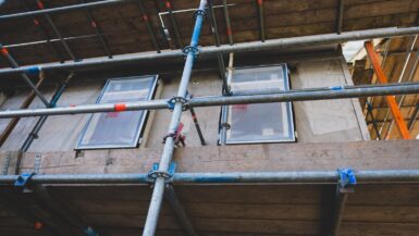 documents d'urbanisme close view of scaffolding attach to the building