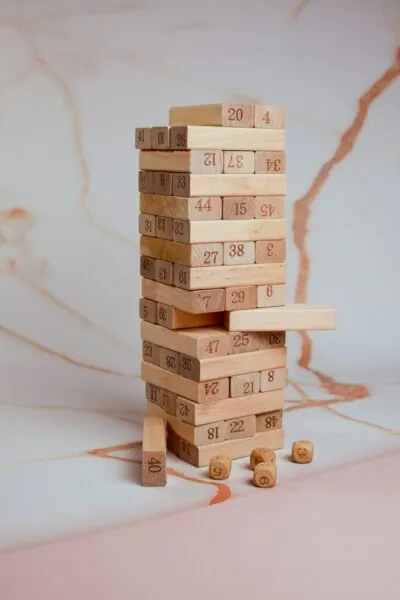 a stack of wooden blocks with numbers on them