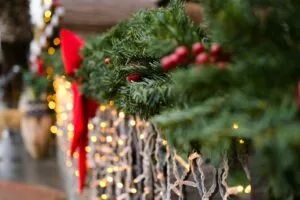 Christmas garland with red bows and lights